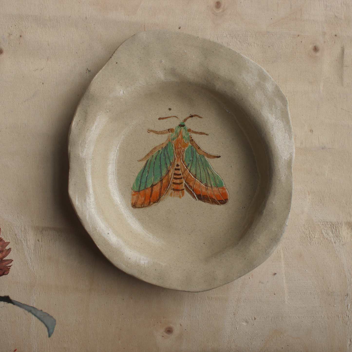 Green moth wall hanging