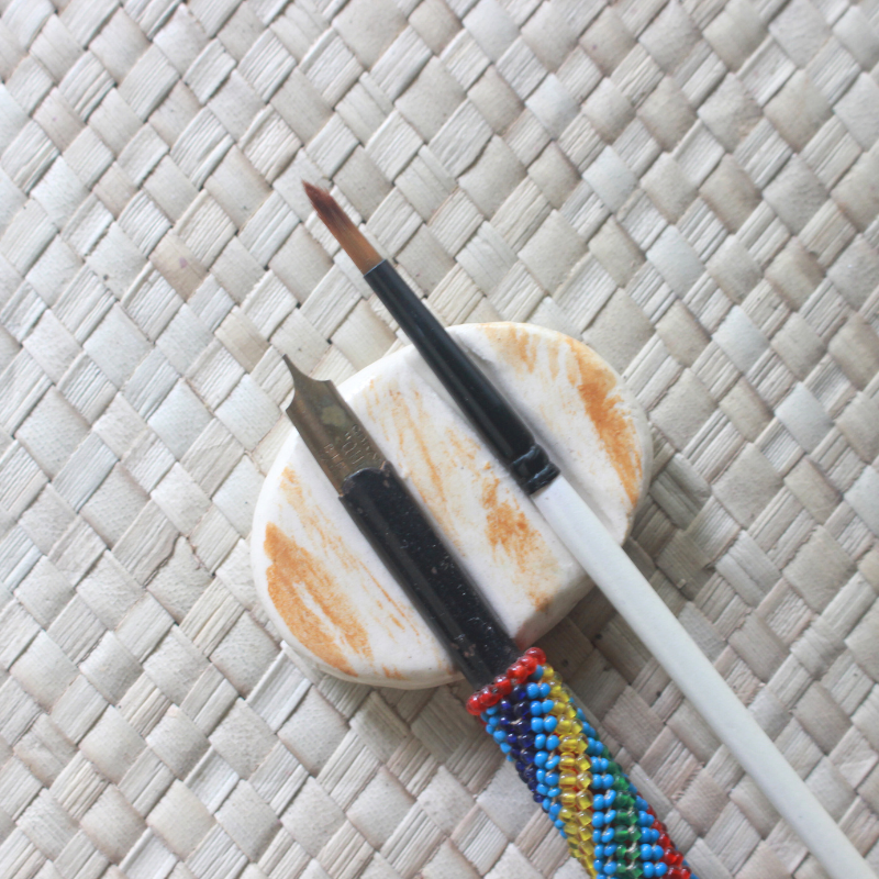 Ceramic brush rest