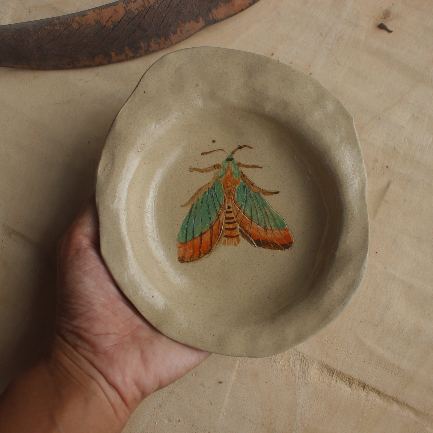 Green moth wall hanging