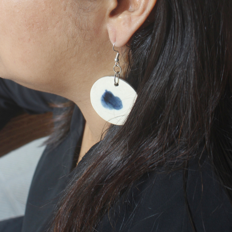 Blue spill ceramic earrings